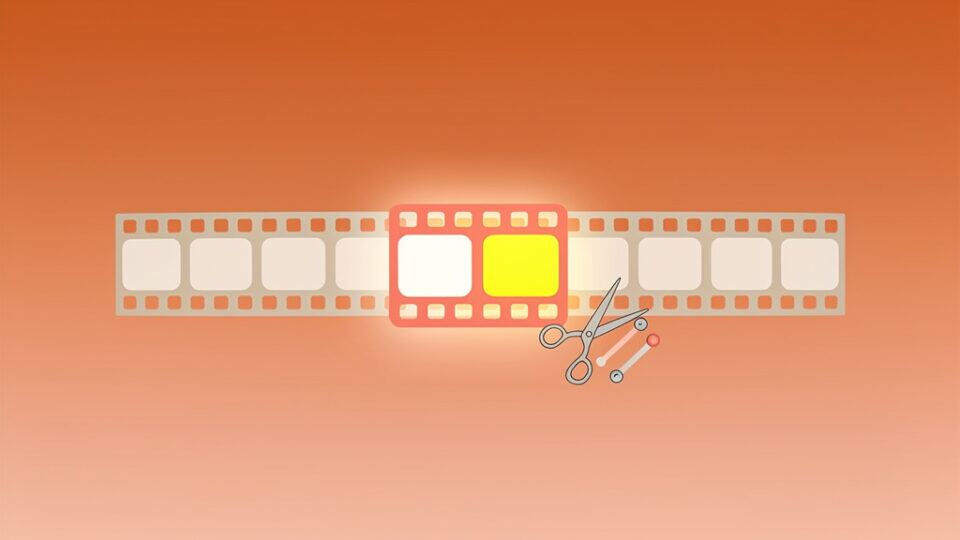 Kadr z filmu z taśmą filmową i nożyczkami, symbolizujący edycję i produkcję filmową.